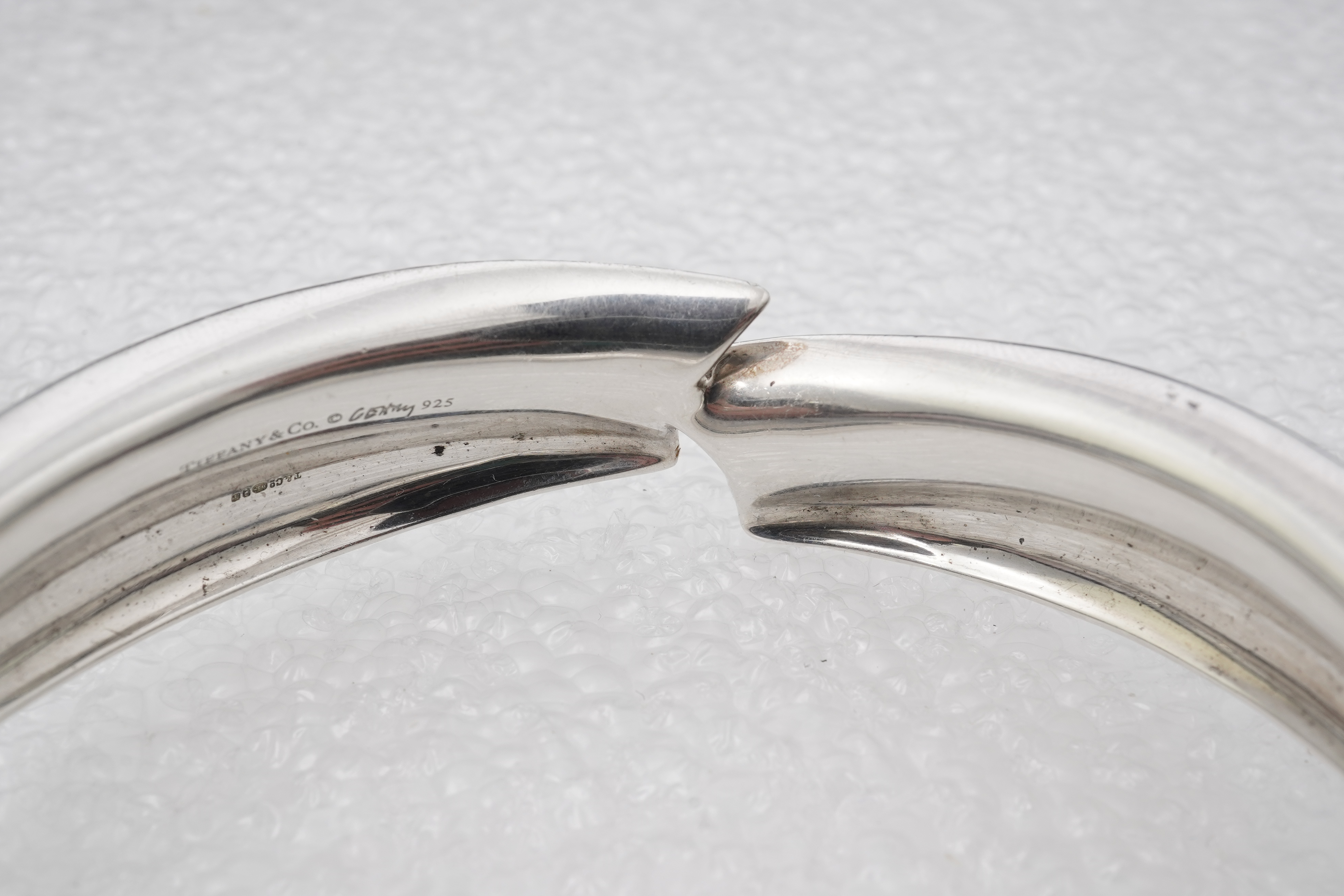 Frank Gehry for Tiffany & Co., a silver 'Fish' bangle, circa 2008